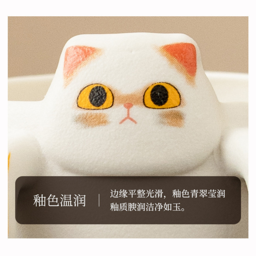 Close-up of a white cat-shaped product with orange accents on a beige background